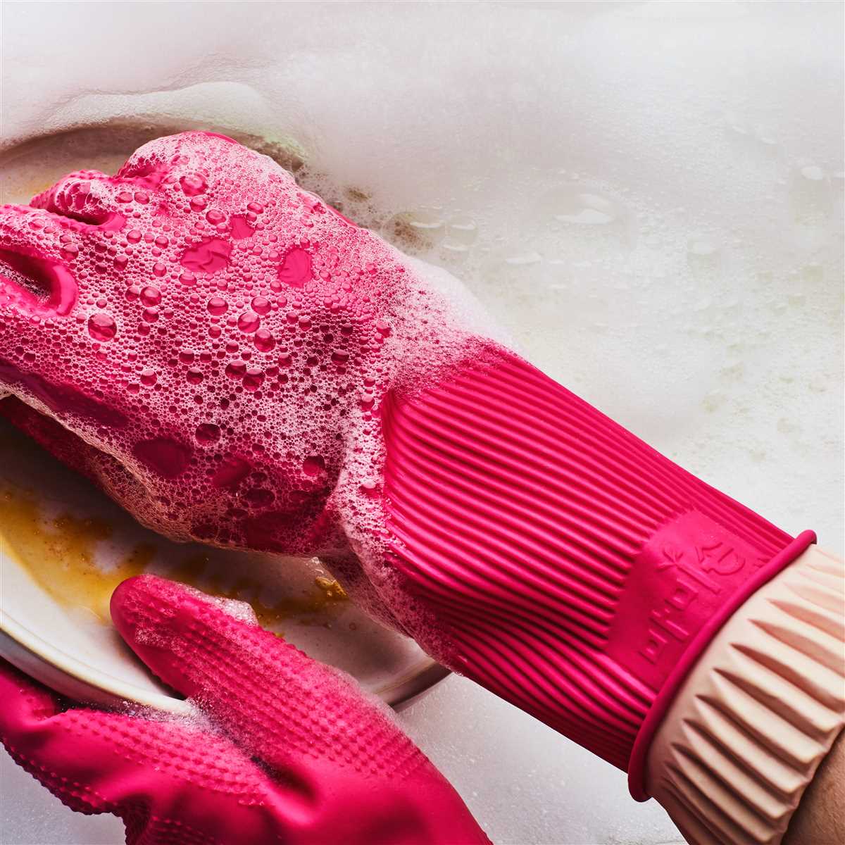 The importance of using rubber gloves while dishwashing