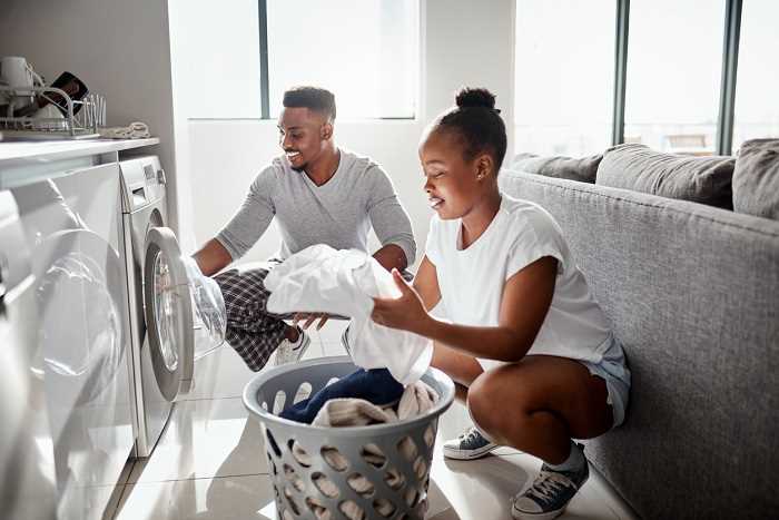 Which clothes should be washed by hand?